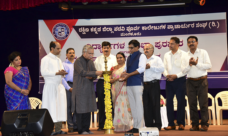 Felicitation of PU Board Exam Toppers and Retired PU College Principals